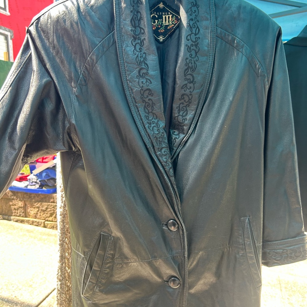 vintage leather coat. very well loved and worn.